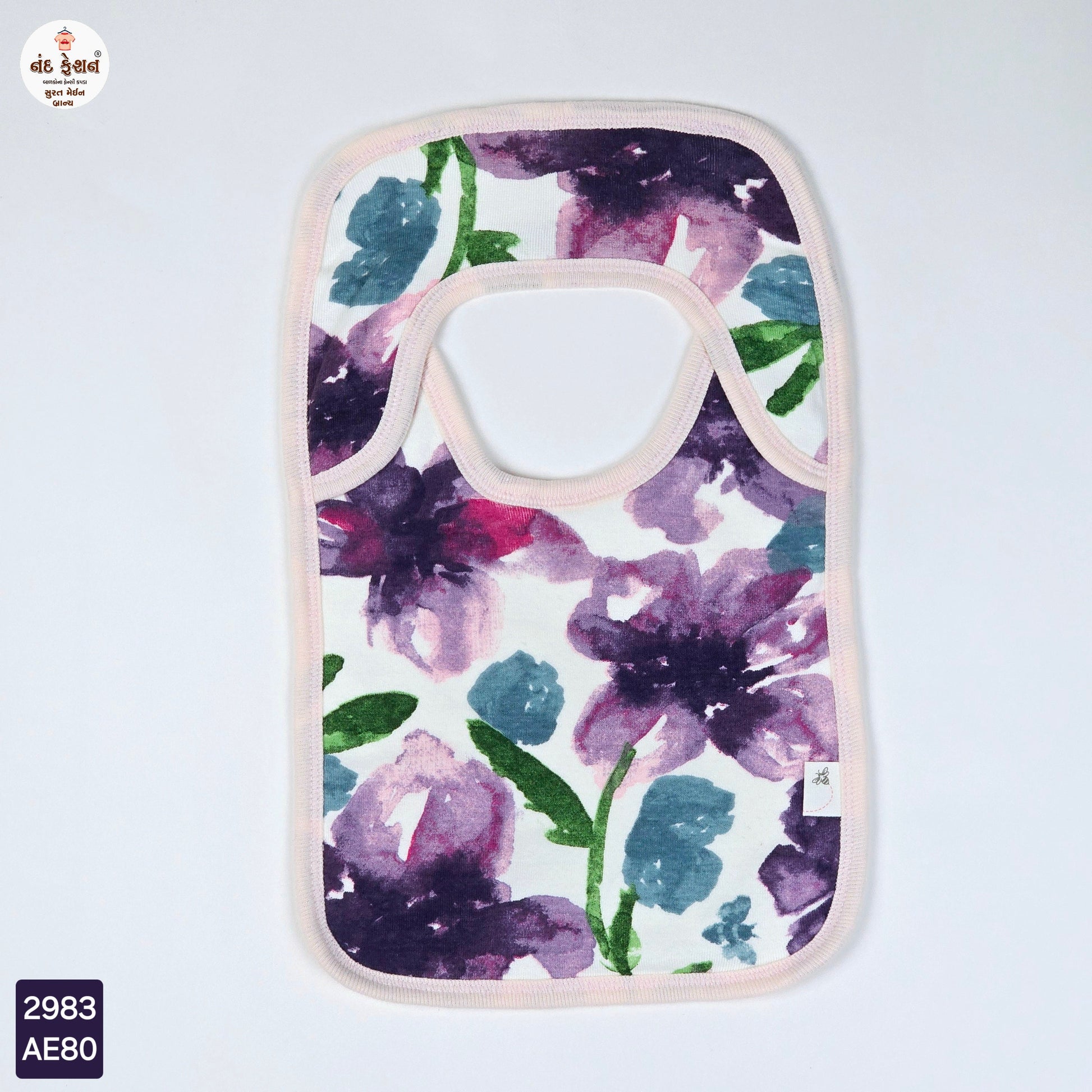 Burt's Bees Baby bib with a watercolor floral design
