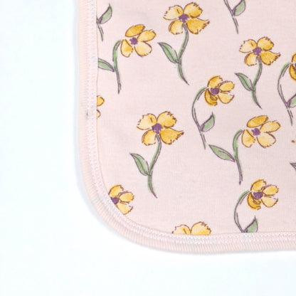 Baby Bib With A Floral Pattern