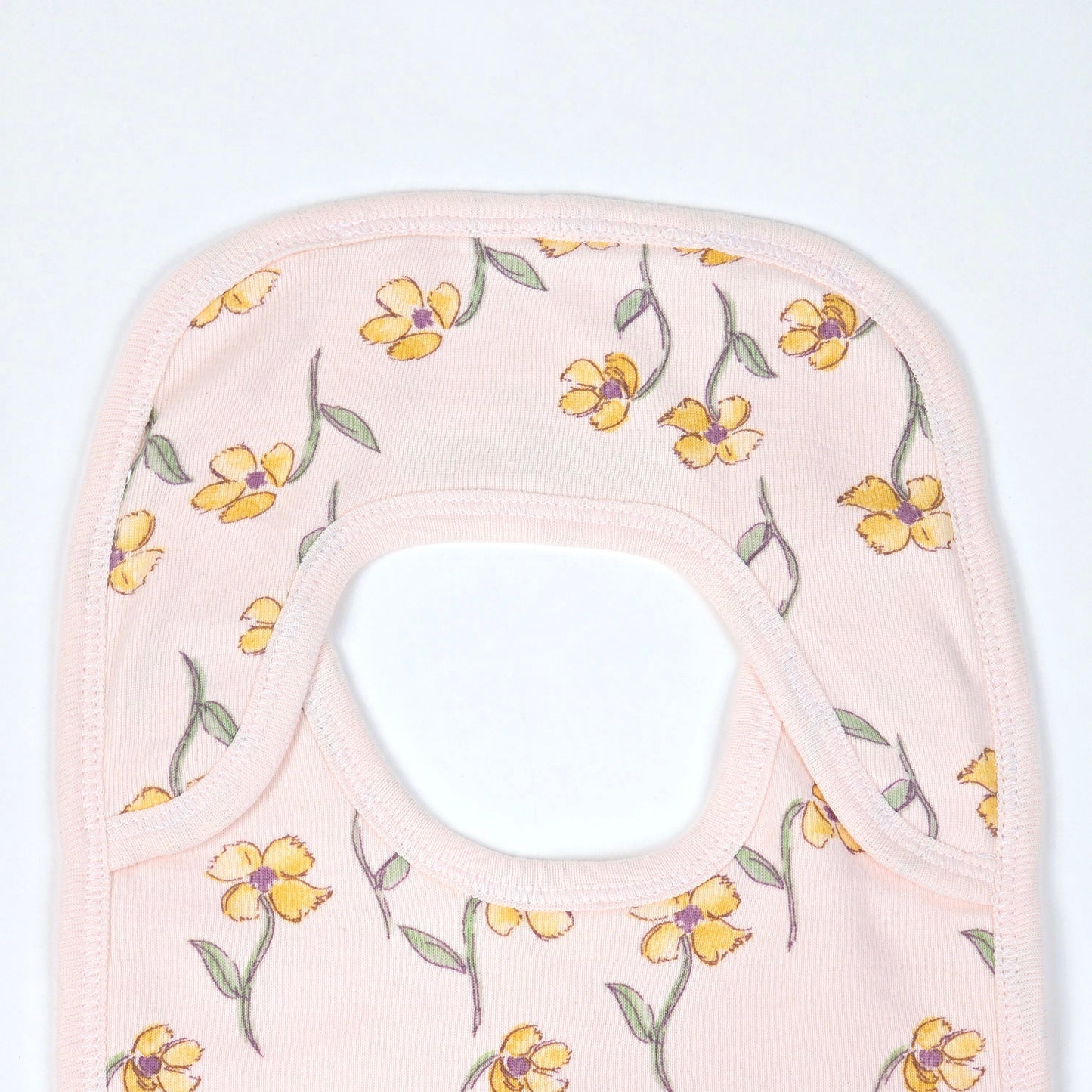 Baby Bib With A Floral Pattern